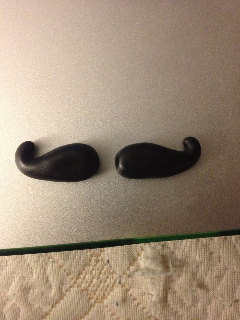 Curl the ends so it looks like a mustache. You can add more curl at the end or less.