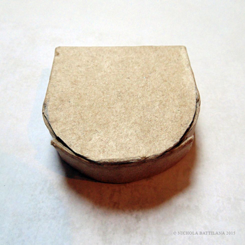 Curve the edges to break up the fibers and glue them into an arched shape as shown. You can sand the edges to create a smoother shape.