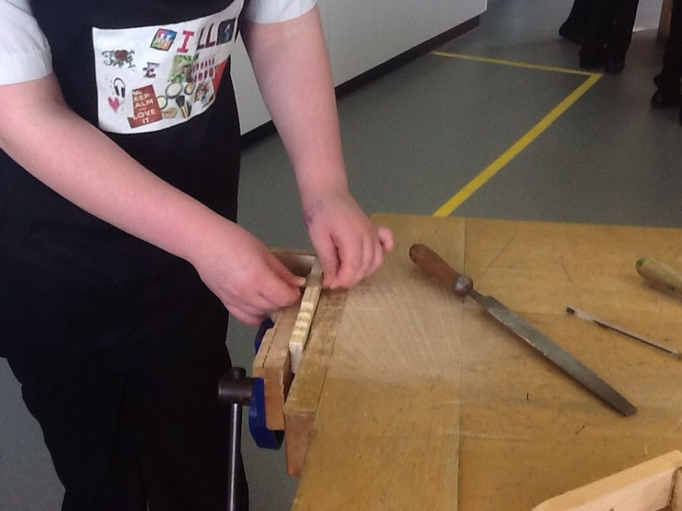 Curving down the edges with glass paper