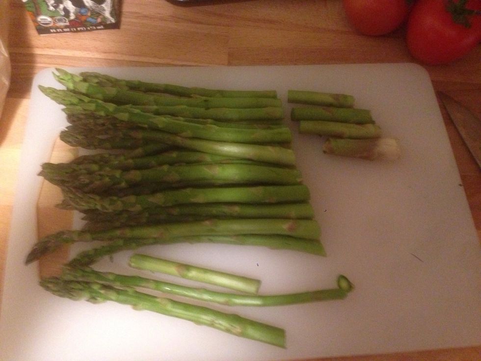 Cut 1/3 of bottom of asparagus and peel the rest before the "head"