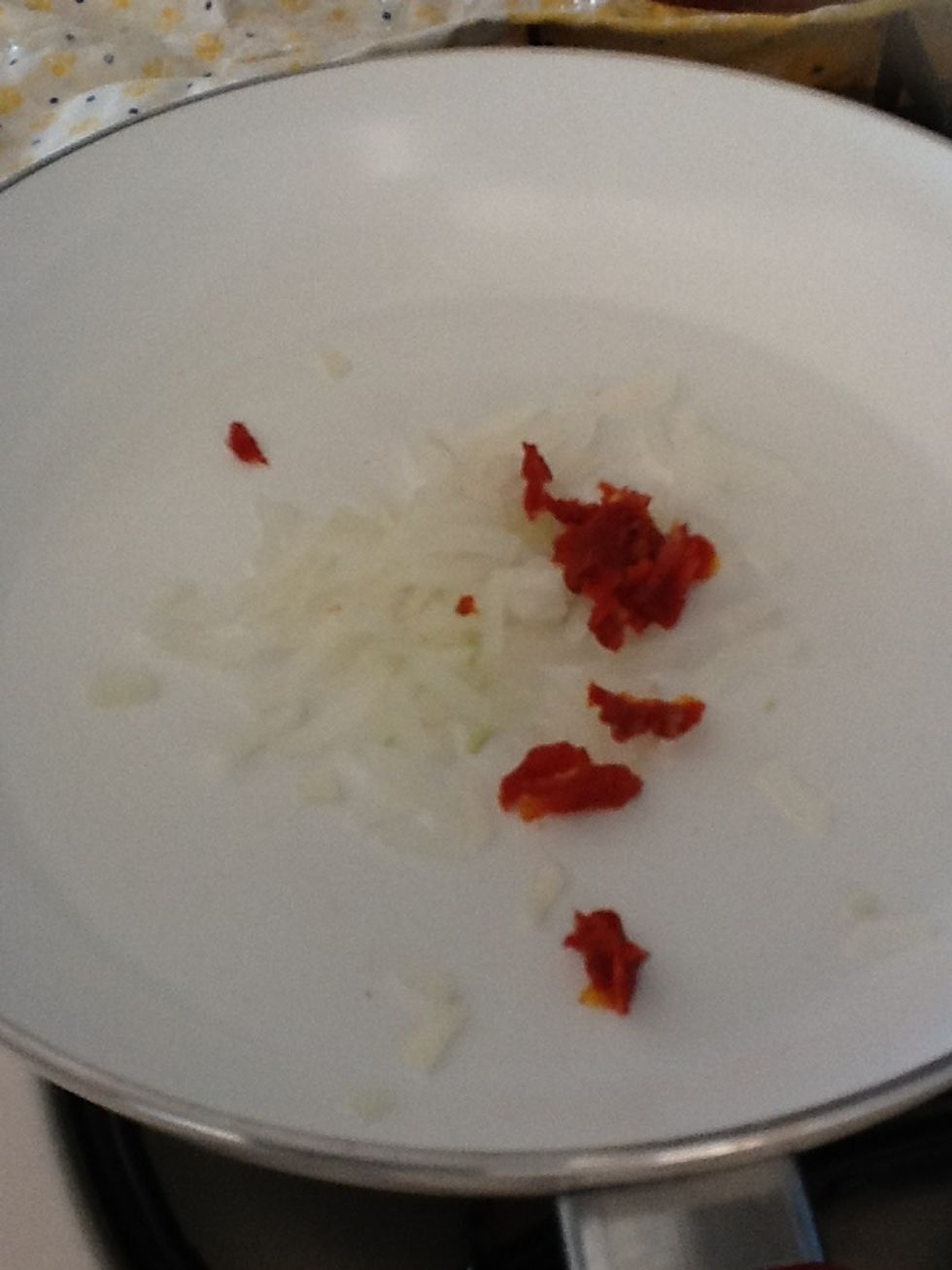 Cut 1/4 of onion and add tomato with salt.