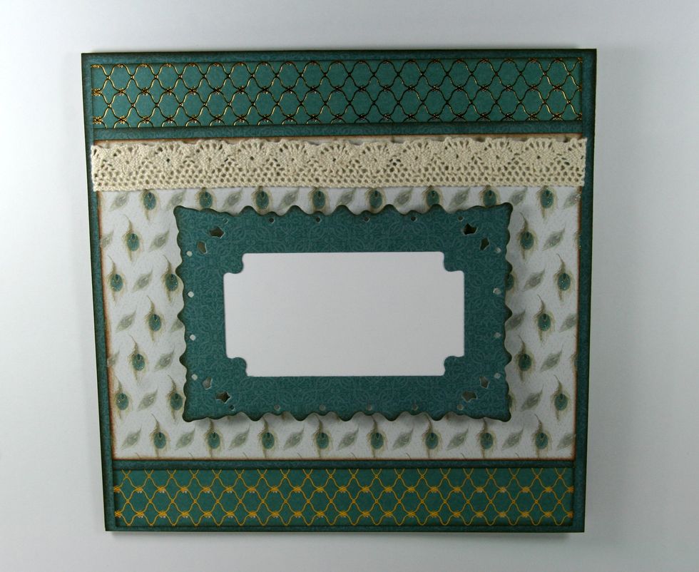 Cut 1 Family Portrait Downton Abbey Die from the patterned paper. Secure scrap paper to the back and adhere with foam spacers.