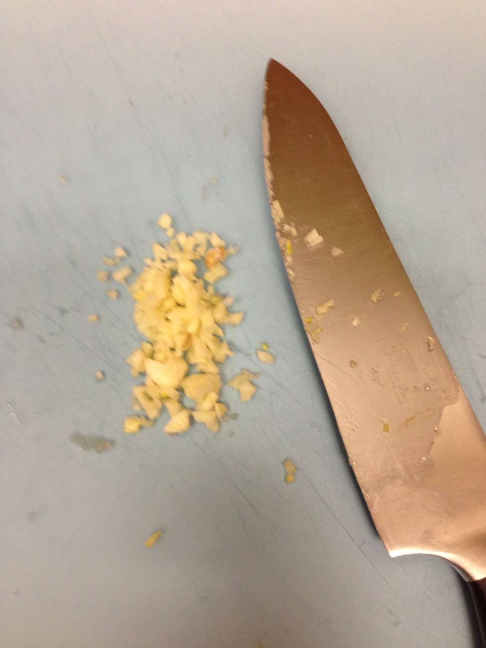 Cut 1 garlic clove