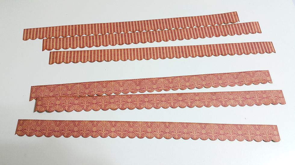 Cut 1" strips of papers with 3-1/2" width, punch or cut by scissors the edges, ink if desired.