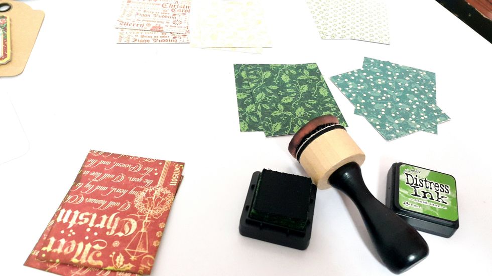 Cut 12 pieces of papers from Graphic 45 A Christmas Carol in 2"x2-1/2", apply Distress Ink if needed