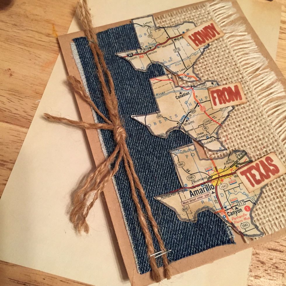cut 2 - 10" pieces of jute, knot ends together to make circle. cut circle apart and attach to card front with staples. put a bit of glue under knot to reinforce
