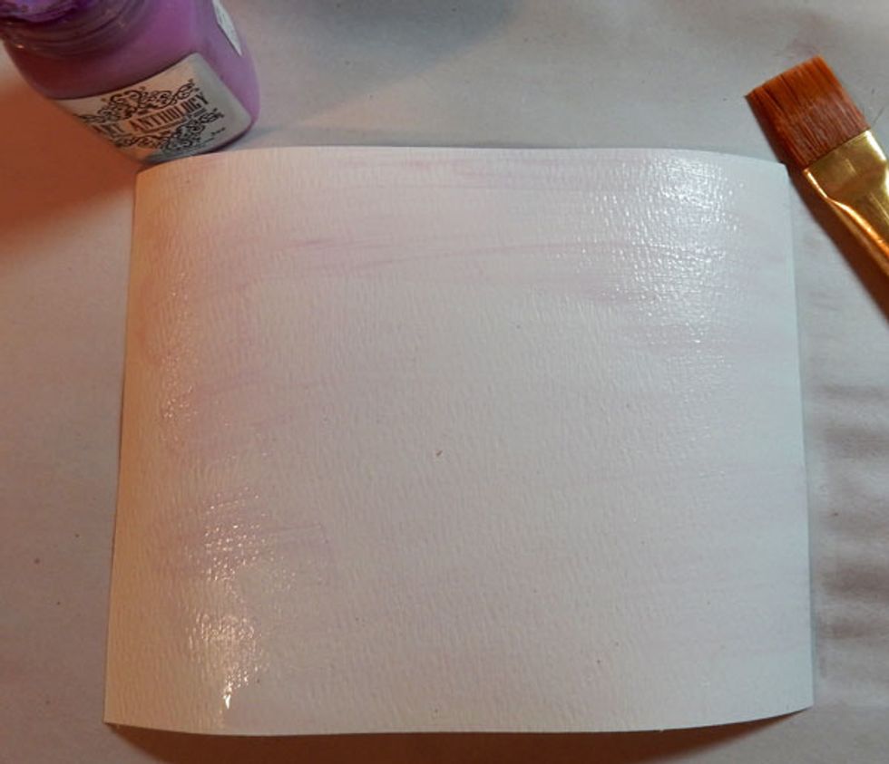Cut 2 pieces of watercolor paper to fit card front, then spritz with water and paint a light coating of Orchid Velvet.