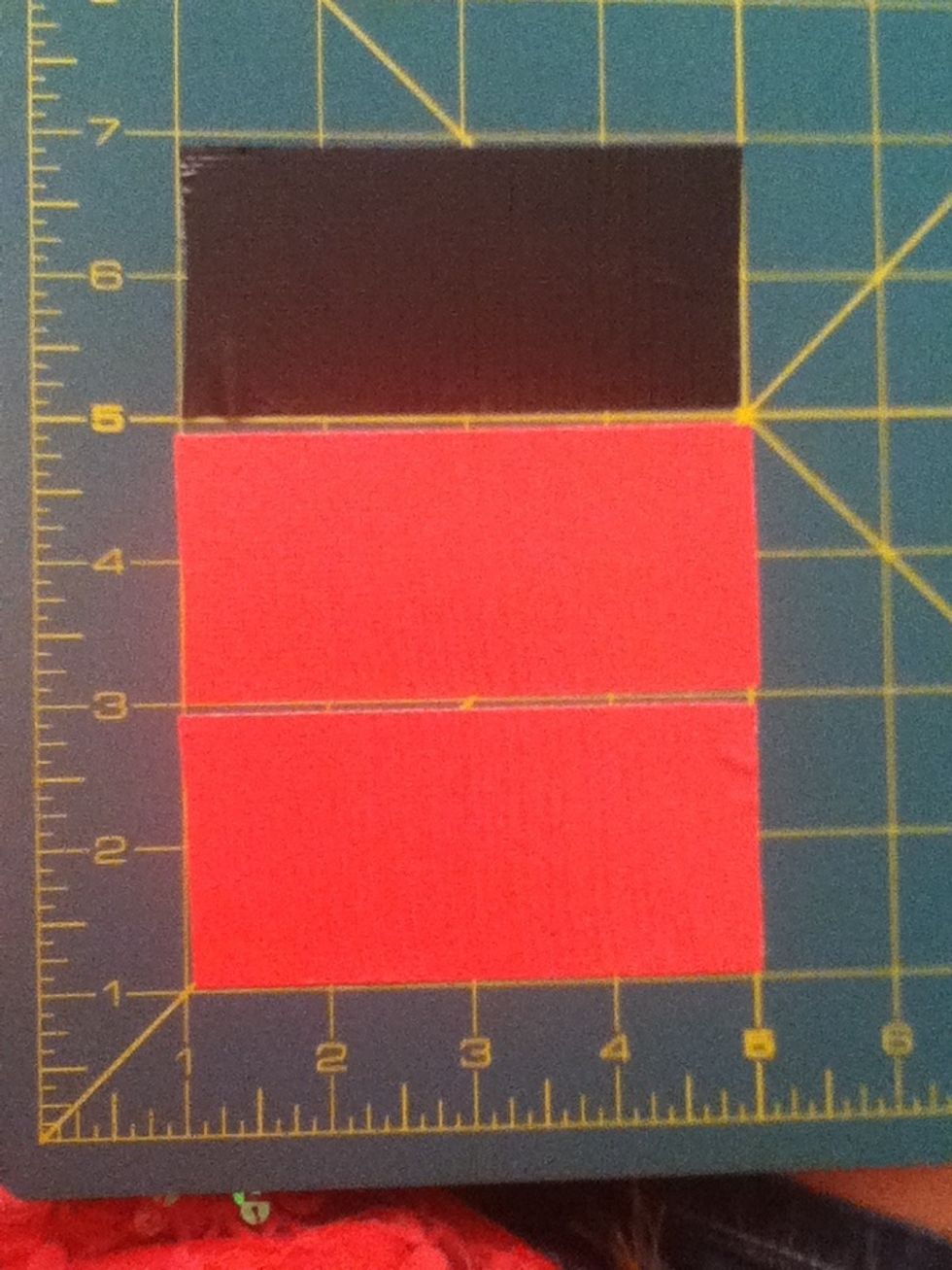 Cut 2 pink pieces and 1 black piece of Ductape 4 inches long.
