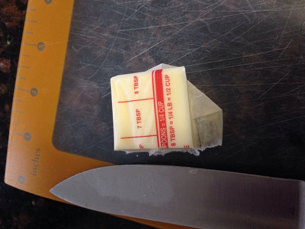 Cut 2 Tbsp of butter.