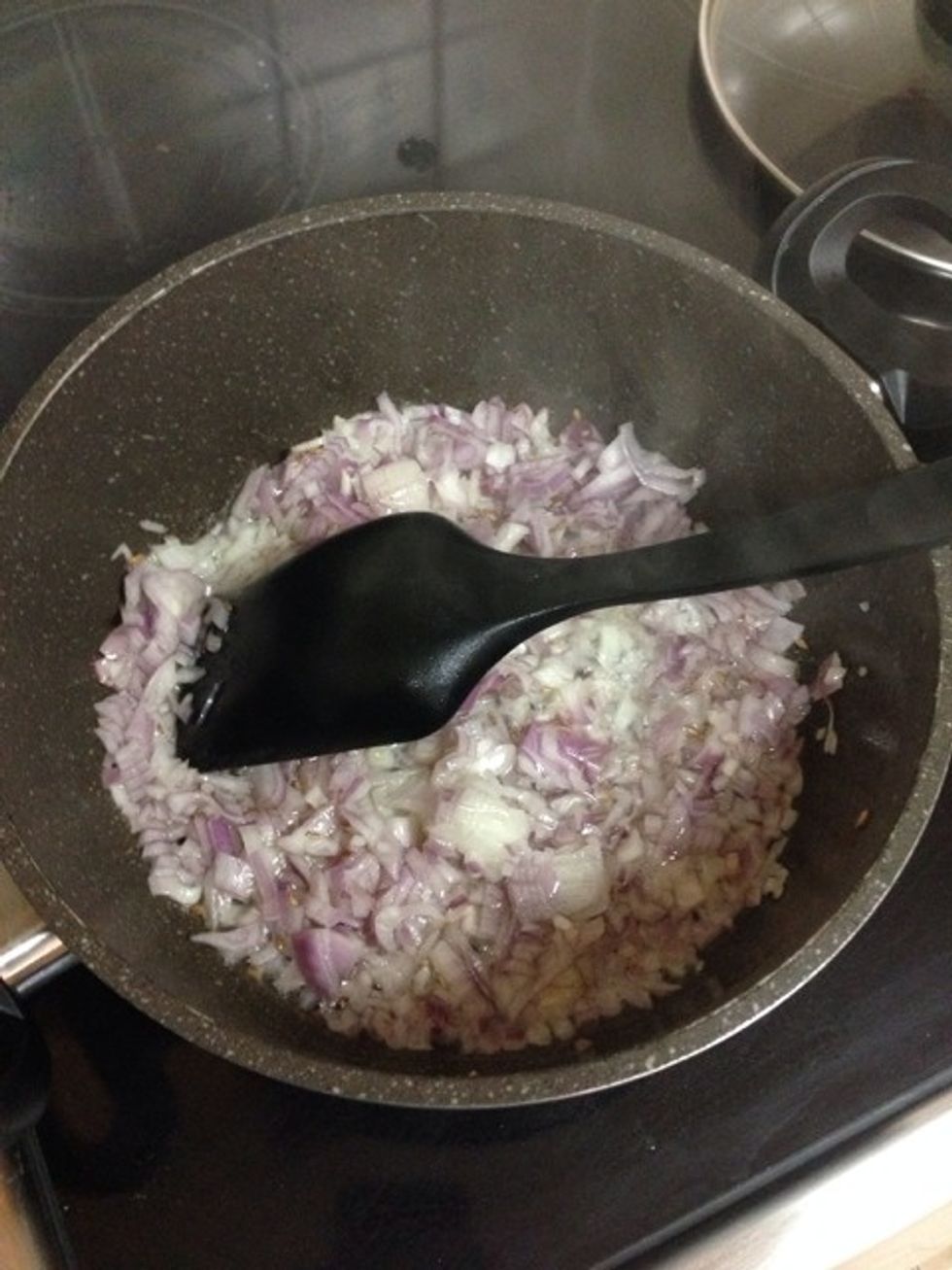 Cut 2medium onions and add to saucepan. Add cumin (1/2 tsp)