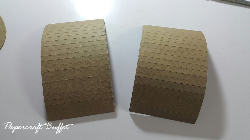 Cut 2pcs 6"x3" chipboard, cut the first layer of the chipboard pieces, as shown, on every 1/4 inch in order to make it curve.