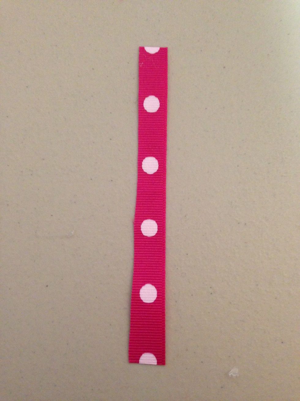 Cut 3/8 inch piece of ribbon,heat seal.BE CAREFUL!