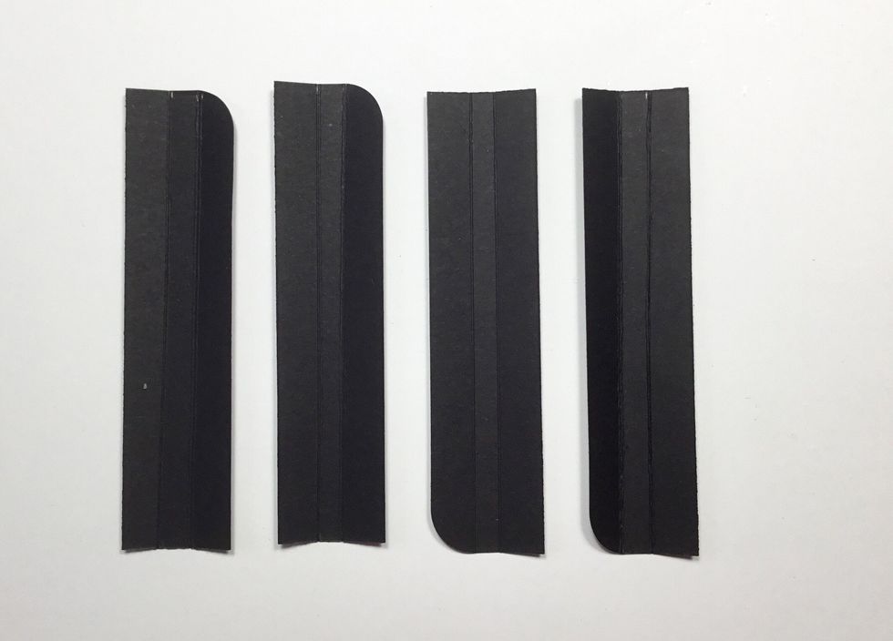 Cut 3 rectangular pieces from black cardboard measuring 2.5cm x 10cm. Score 1cm in from each side as shown.