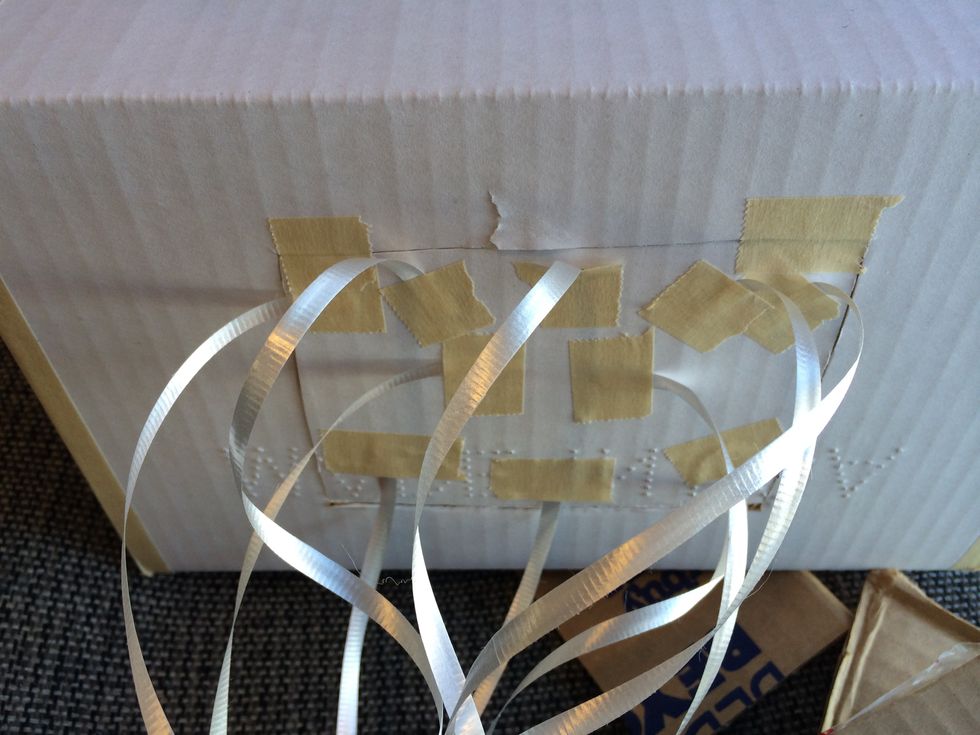 Cut 3 sides for a candy door on the bottom, & add pull strings. (I used ribbon) All but one are just loosely taped to the bottom of the door...