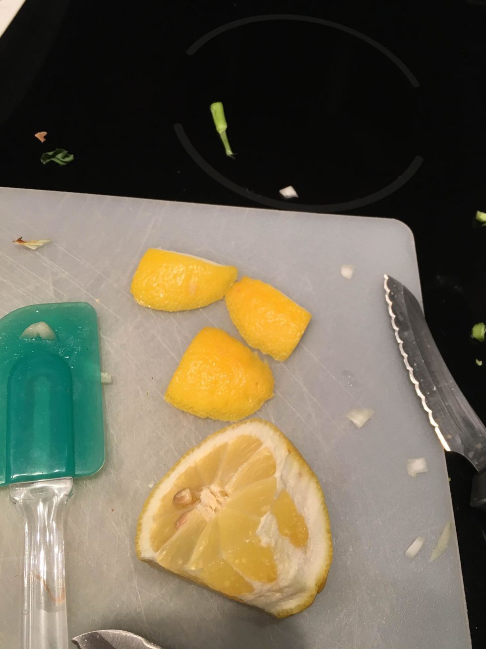 Cut 3 small slices of peel off of the lemon.