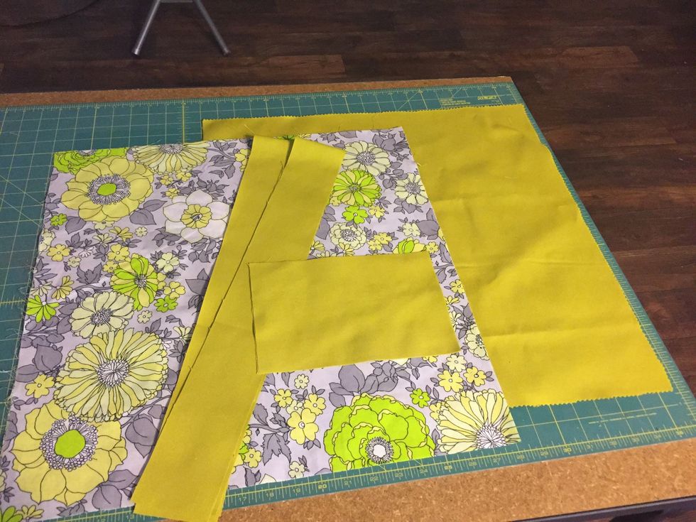 Cut 4 20x20 pieces (2 from each pattern, main and lining), 2 36x3 strips for handles of tote bag, and 2 6x9 pieces (I am using lining fabric) for your pockets.