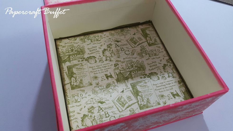 Cut 4-3/4"x4-3/4" paper for the base of storage box, apply Distress Ink, adhere.