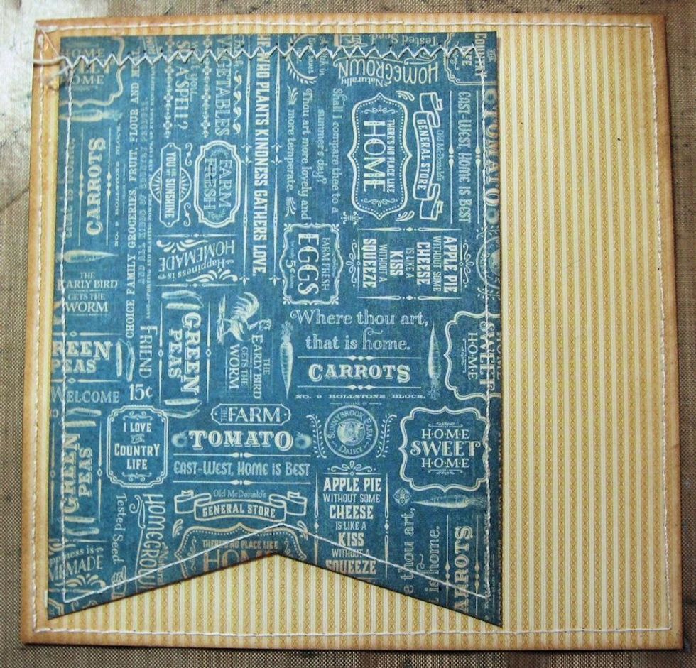 Cut 4" x 4.75" banner flag from blue patterned paper. Stitch, if desired and glue onto yellow striped paper.