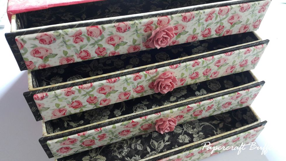Cut 4pcs of chipboard 1-1/8"x7-3/8" and 4pcs of 1"x7", wrap with paper, adhere on the front of drawers as front board. If you would like to stop here, its fine.