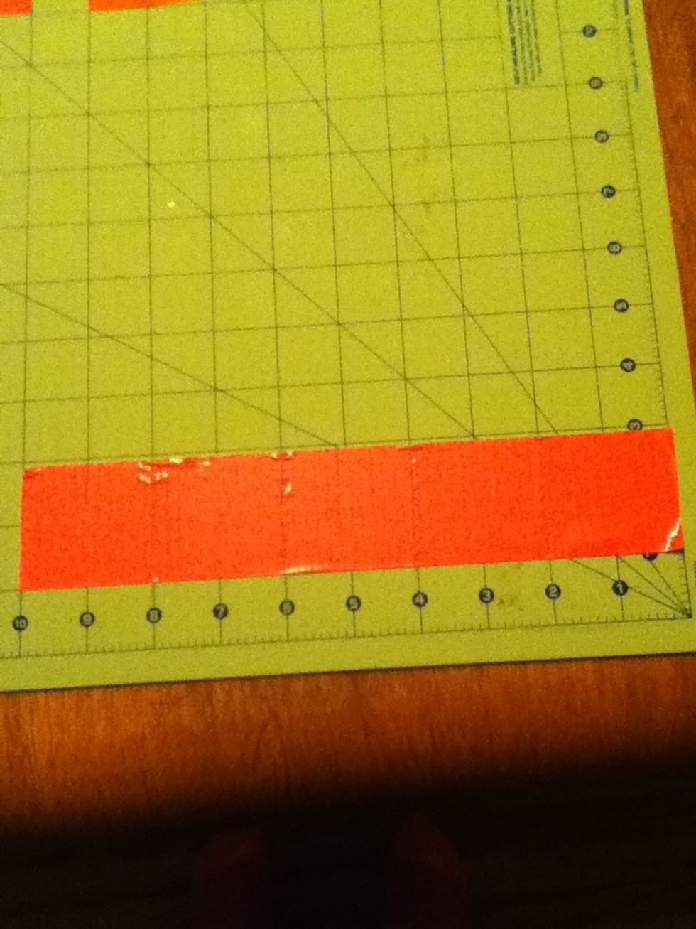 Cut 5 more 2 inch pieces of tape