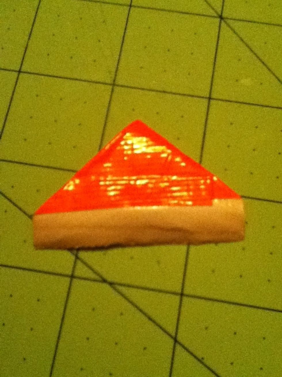 Cut 5 more 2 inch strips and fold them (the second colour)