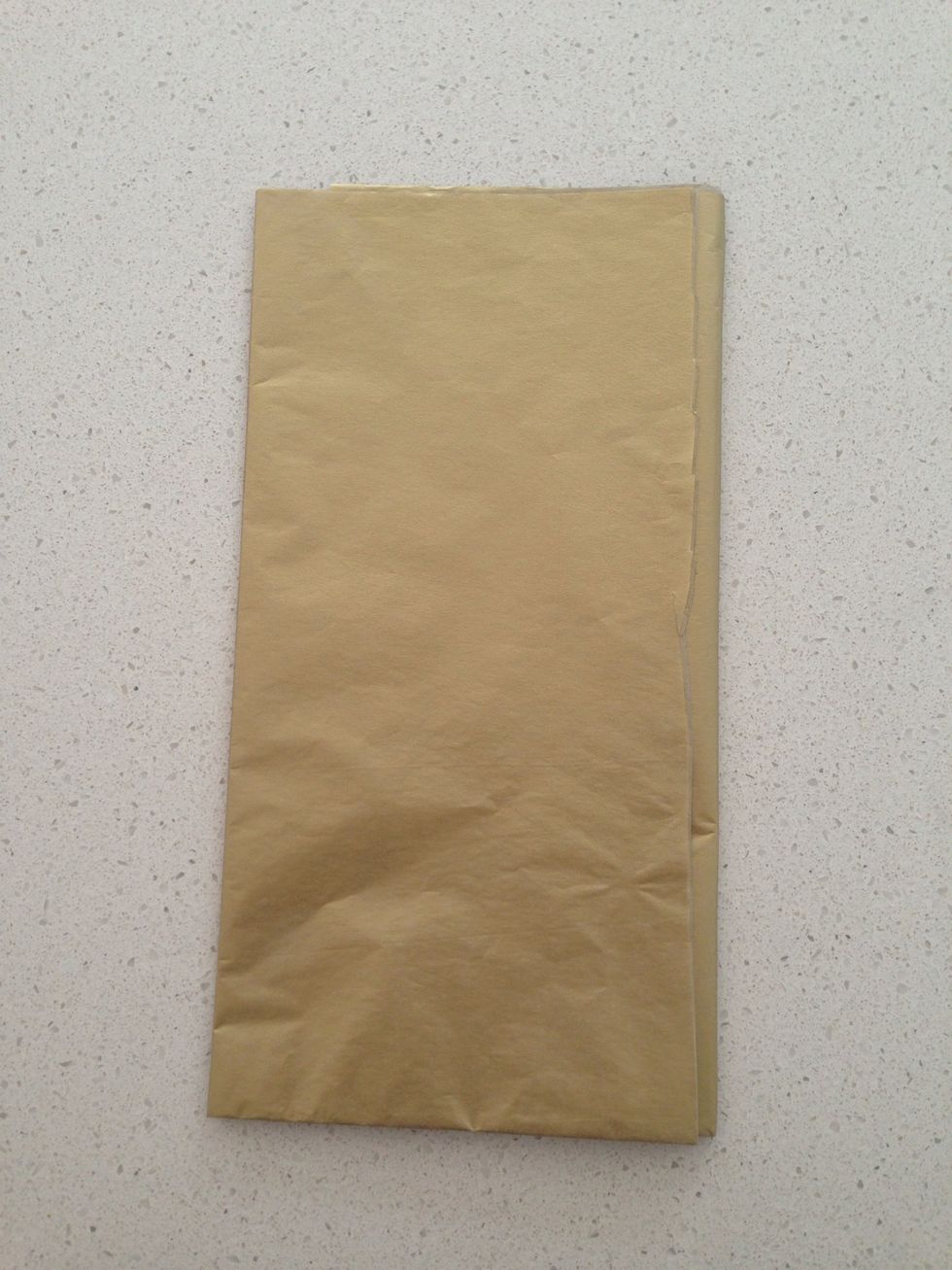 Cut 6-8 sheets of tissue paper into rectangle, in this pict I measure approx 5inch width and 10-12inch length. This size makes a flower of the size of my fist.