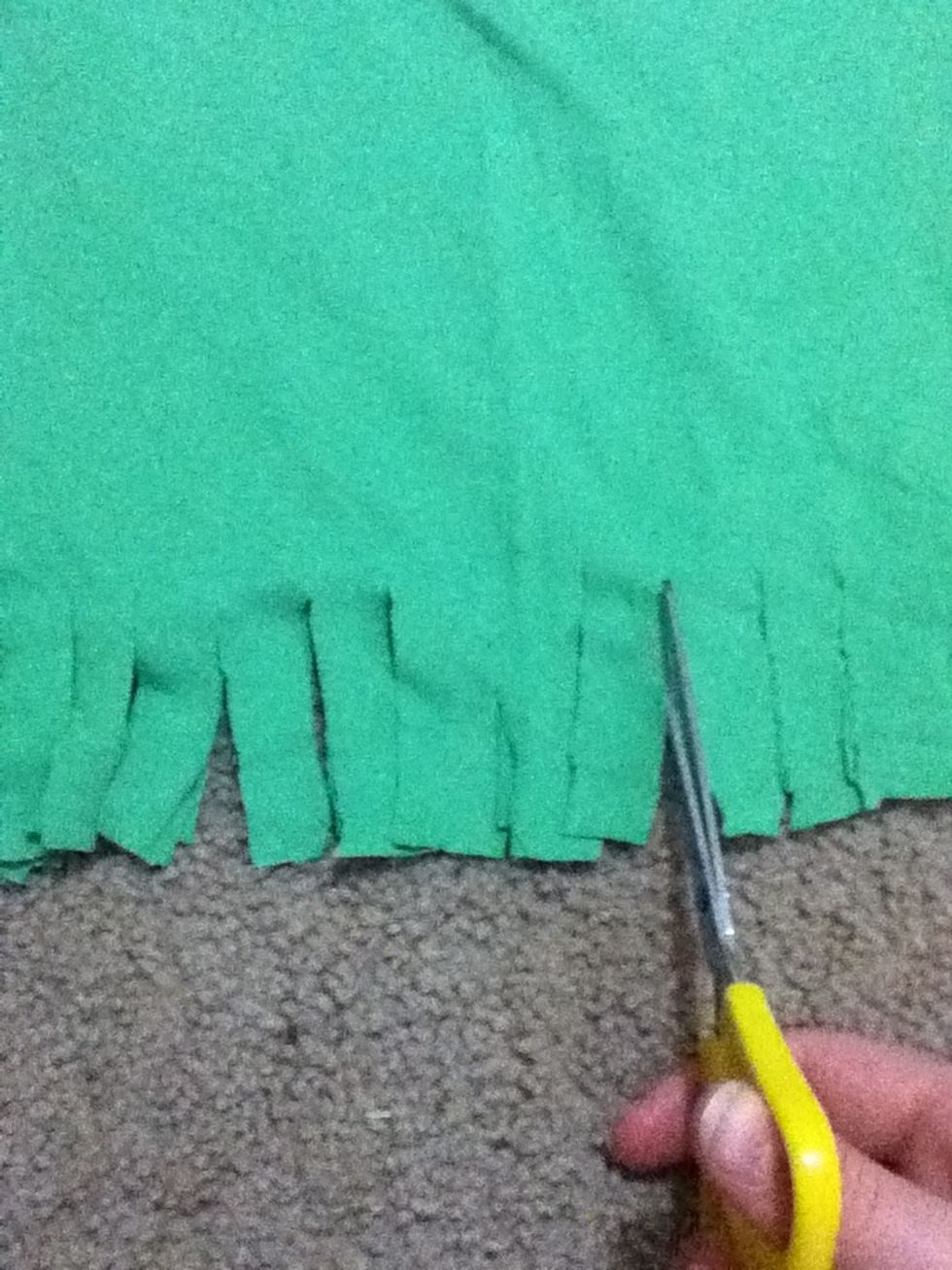 Cut 7cm long lines up from the bottom, 2cm apart