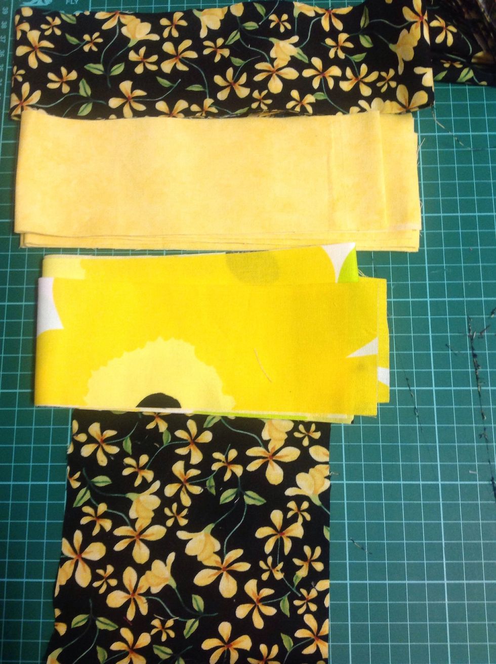 Cut 7cm wide strips and  two 14cmx14cm squares.