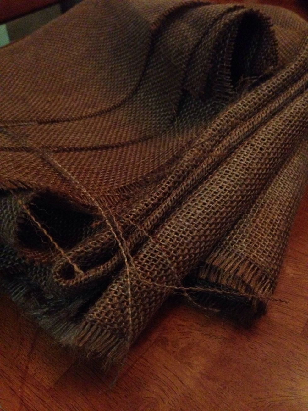 Cut 8 pieces if burlap using the cardboard template. I used brown burlap for my banner pieces. You can use any color or even heavy grade paper.