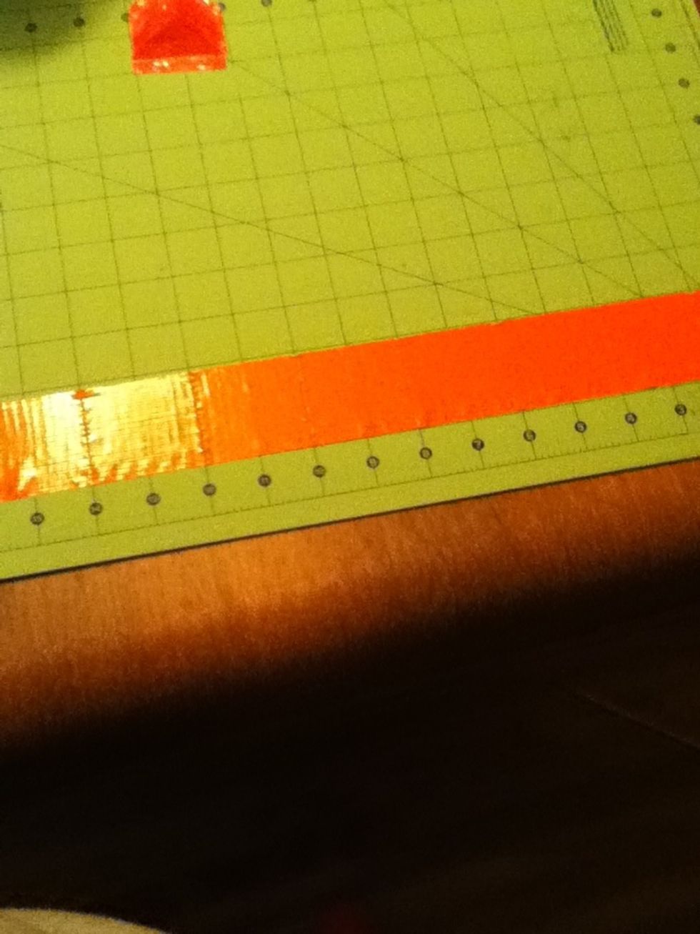 Cut 9 more 2 inch pieces of tape (a different colour)