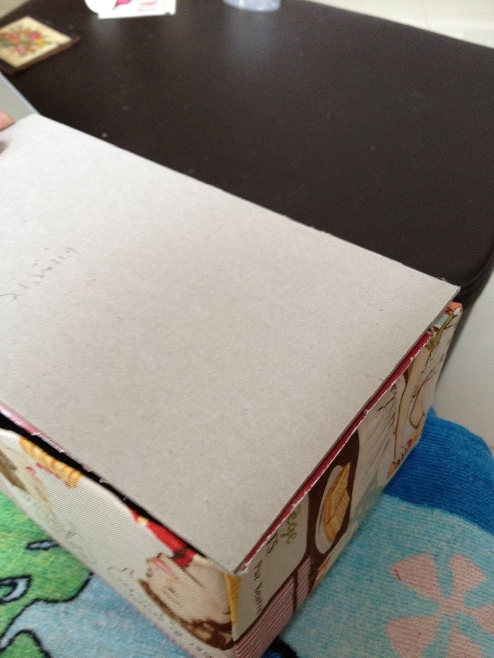 Cut a 2mm card, same size as the cover