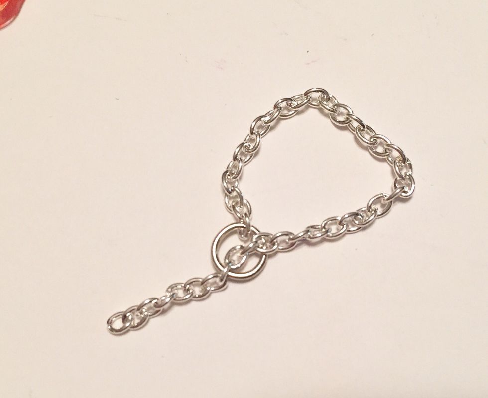 cut a 3" piece of chain and loop the top 2" and attach with small jump ring.