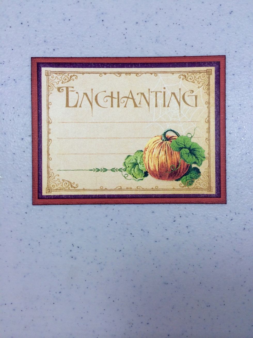 Cut a 4 1/4" x 3 1/4" piece of Tuscan Sunset cardstock. Cut apart the the Enchanting journaling card from "You Bewitch Me" paper, ink edges and adhere these together.