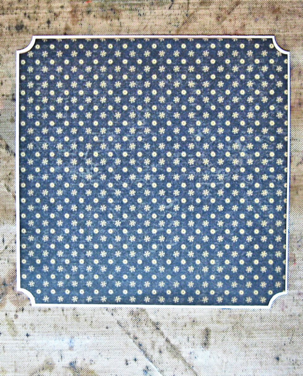 Cut a 4 5/8" square of the black print from the reverse side of Season's Greetings. Shape corners with ticket stub punch. Mat on a slightly larger square of silver cardstock. Shape corners w/punch.