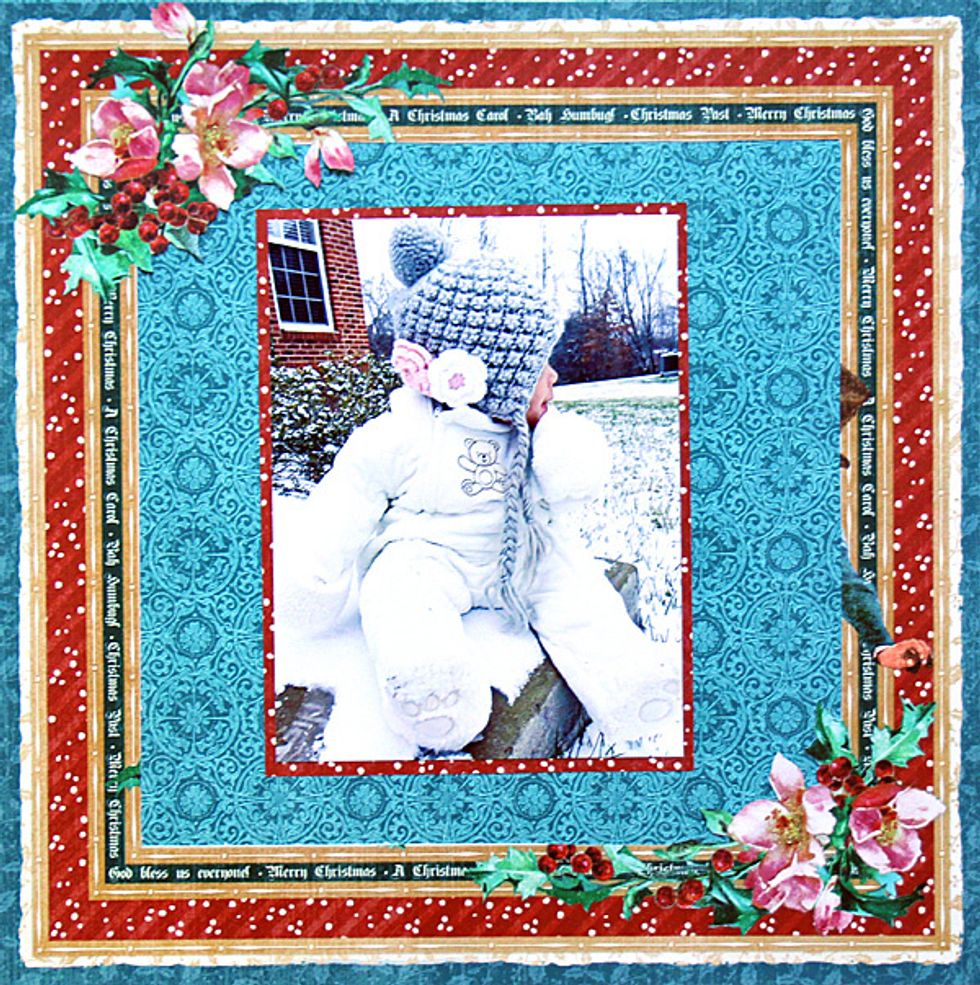 Cut a 5 1/4" x 7 1/4" mat rectangle from the "Christmas Carol" sheet.  Adhere 5" x 7" photo to the center of the mat.  Adhere matted photo to the center of the page.