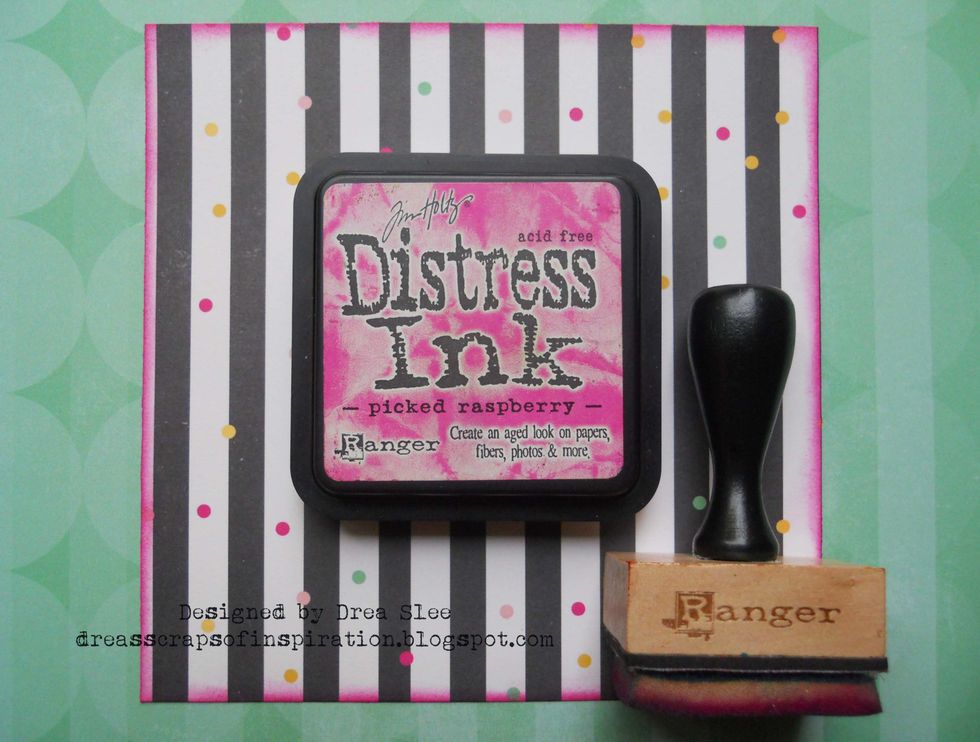 Cut a 5 3/4" square from the striped "Shindig" paper. Apply the Picked Raspberry Distress Ink with your blending tool around the edges.