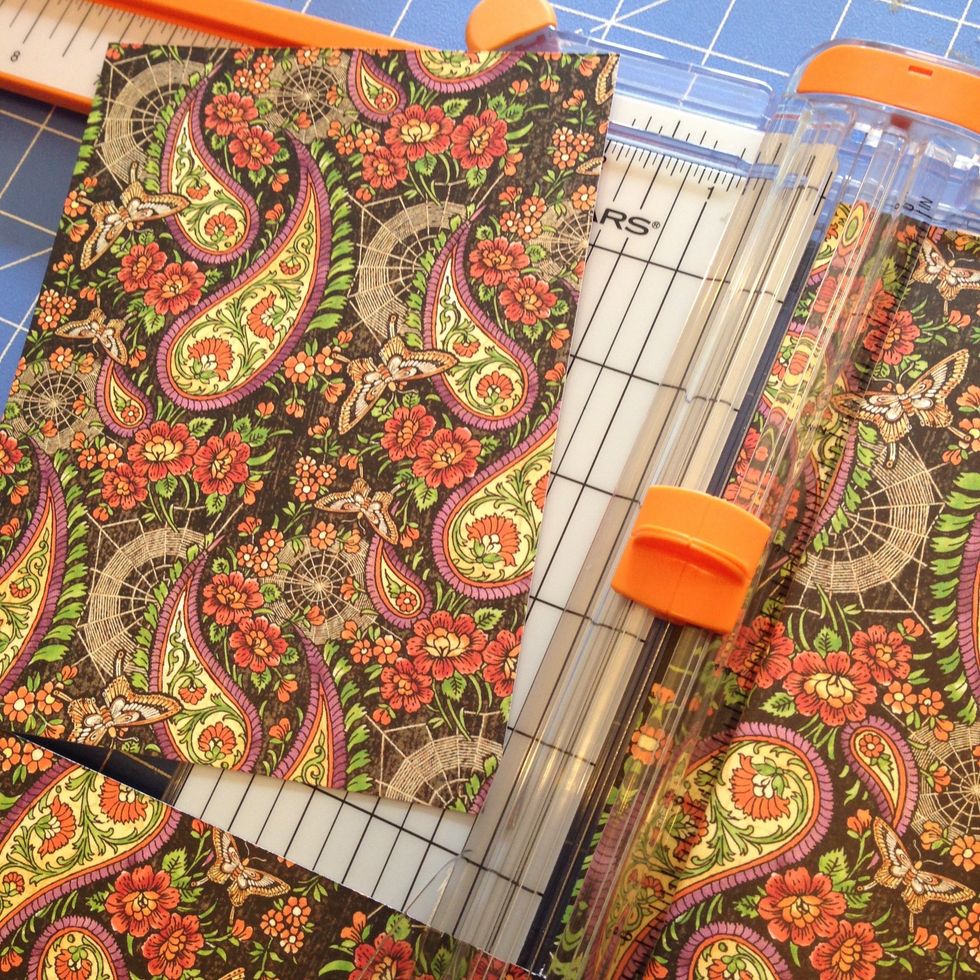 Cut a 5" x 6 1/2 card base from the patterned paper called "Charmed, I'm Sure"  (The paper with orange flowers and butterflies on it.)