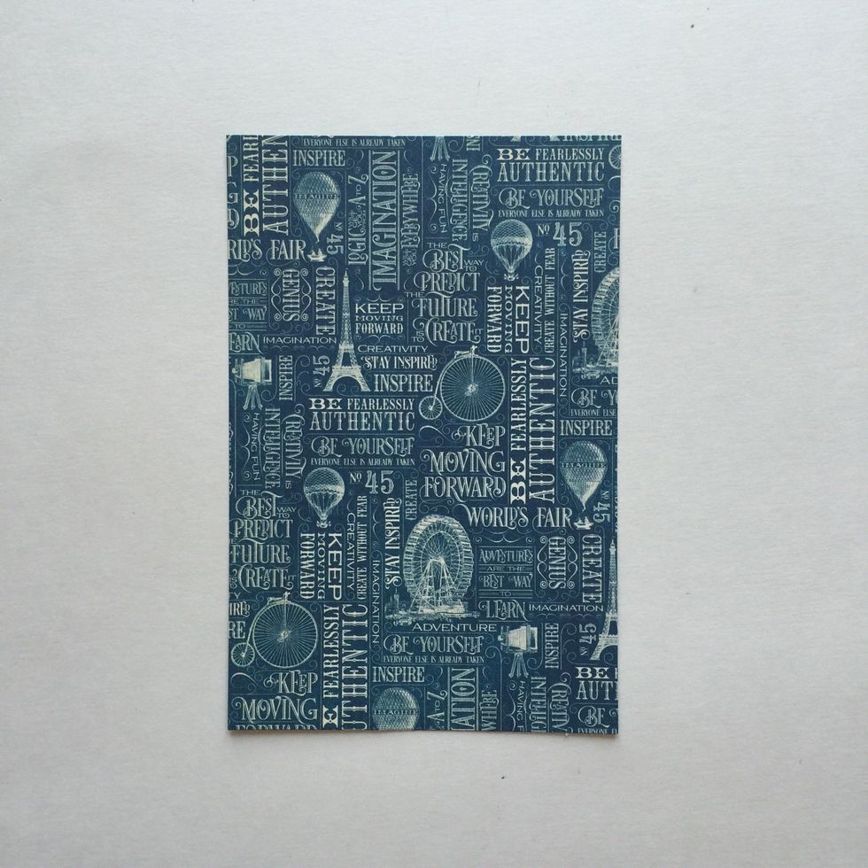 Cut a blue pattern paper from the 6x6 pad to 3 7/8"x 5 7/8".
