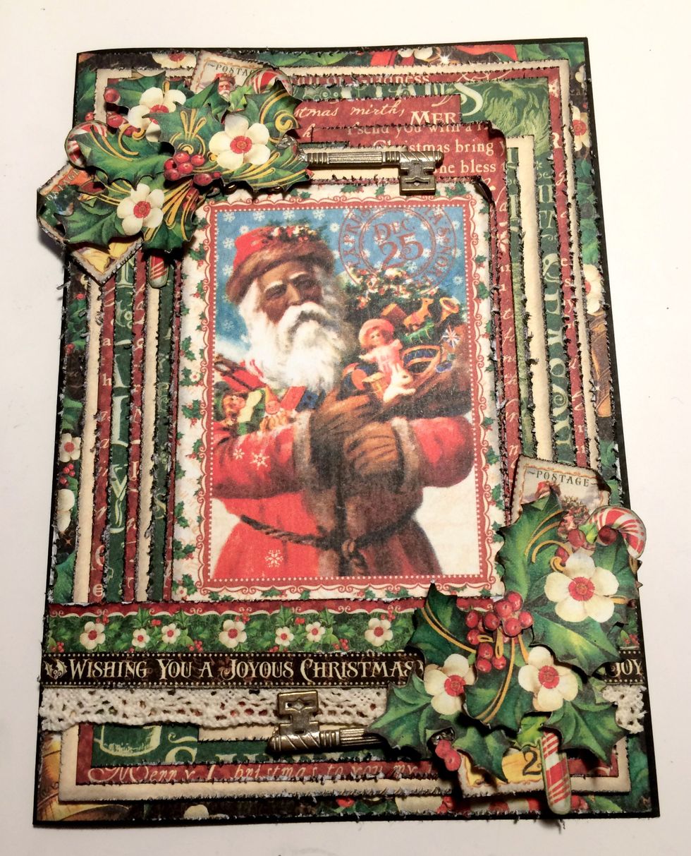Cut a card base out of black cardstock that measures 5" x 7". Adhere the card front to the card base.