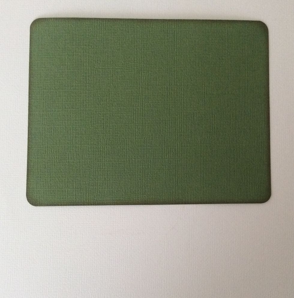 Cut a card stock rectangle in chosen colour at 5 5/8 x 4 3/8 inches and round corners. Ink edges if desired.