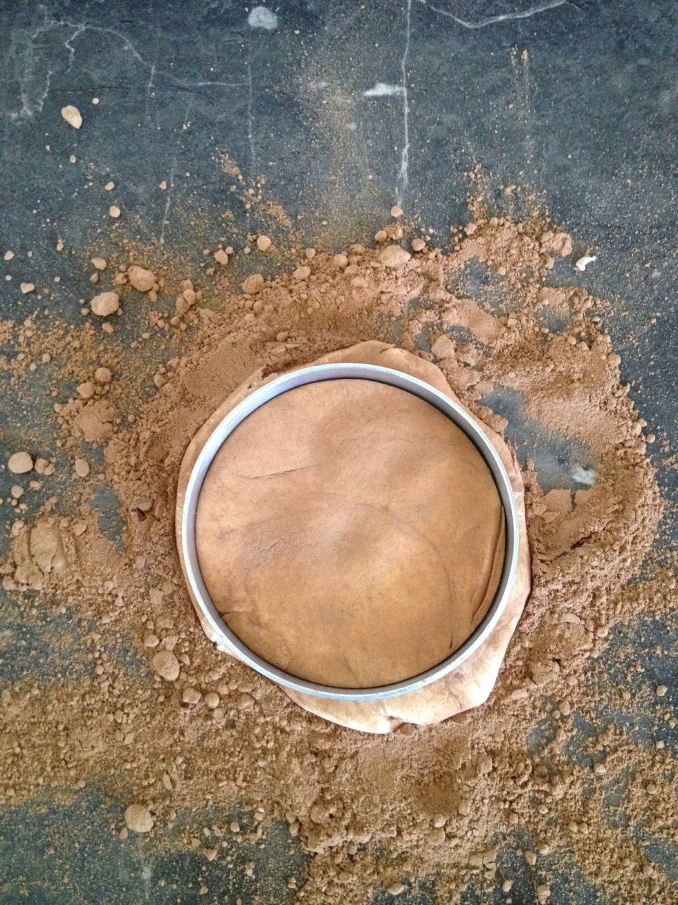 Cut a circle out using a cookie cutter.