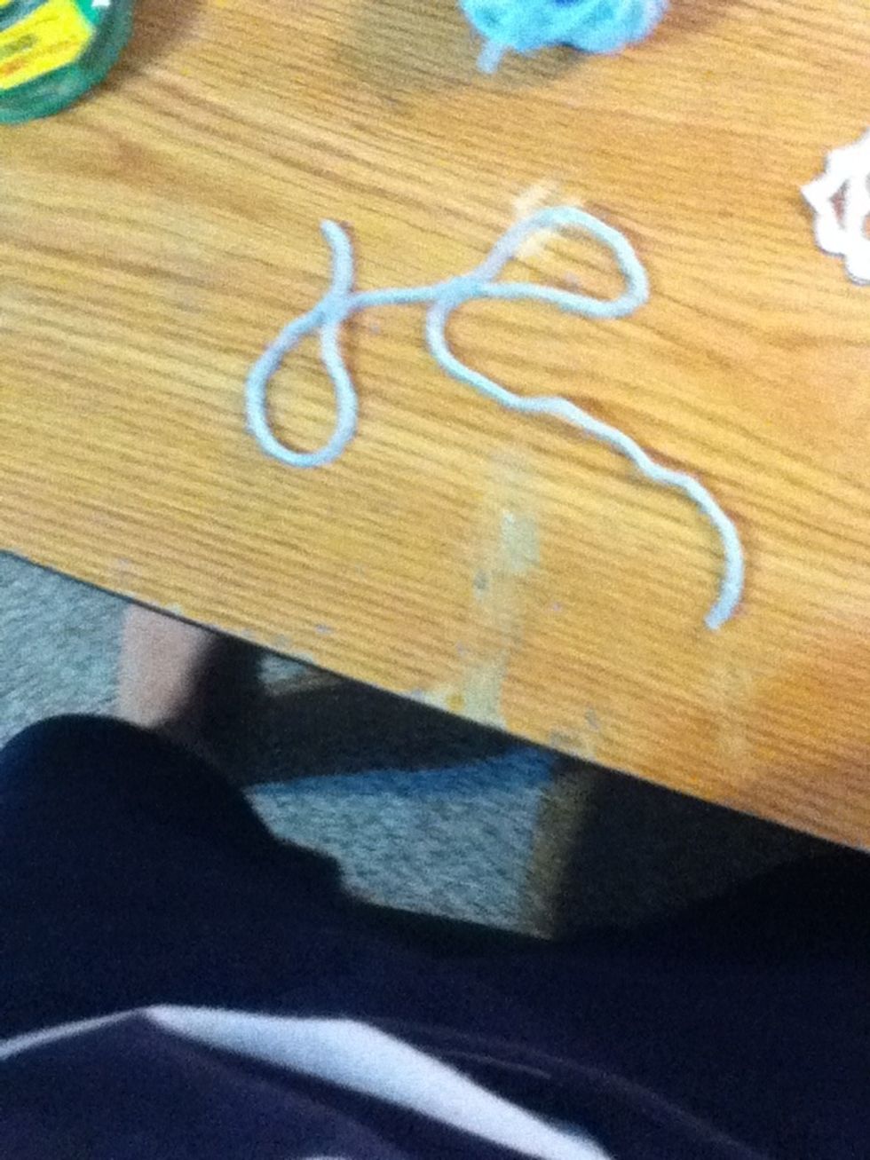 Cut a decent length of string. Cut them different lengths for each snowflake.