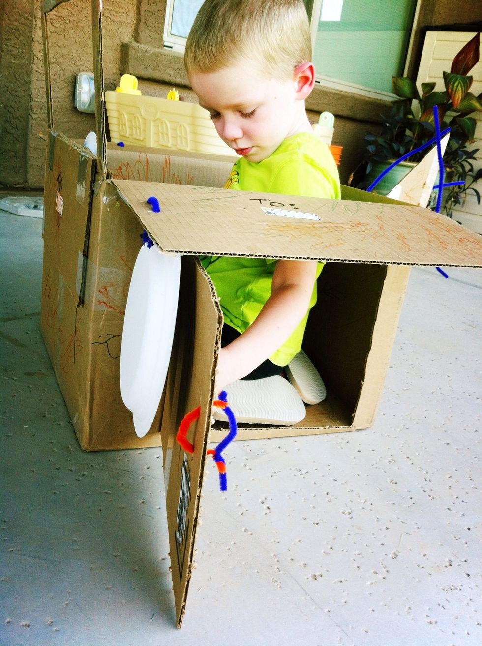 Cut a door & add a pipe cleaner handle.