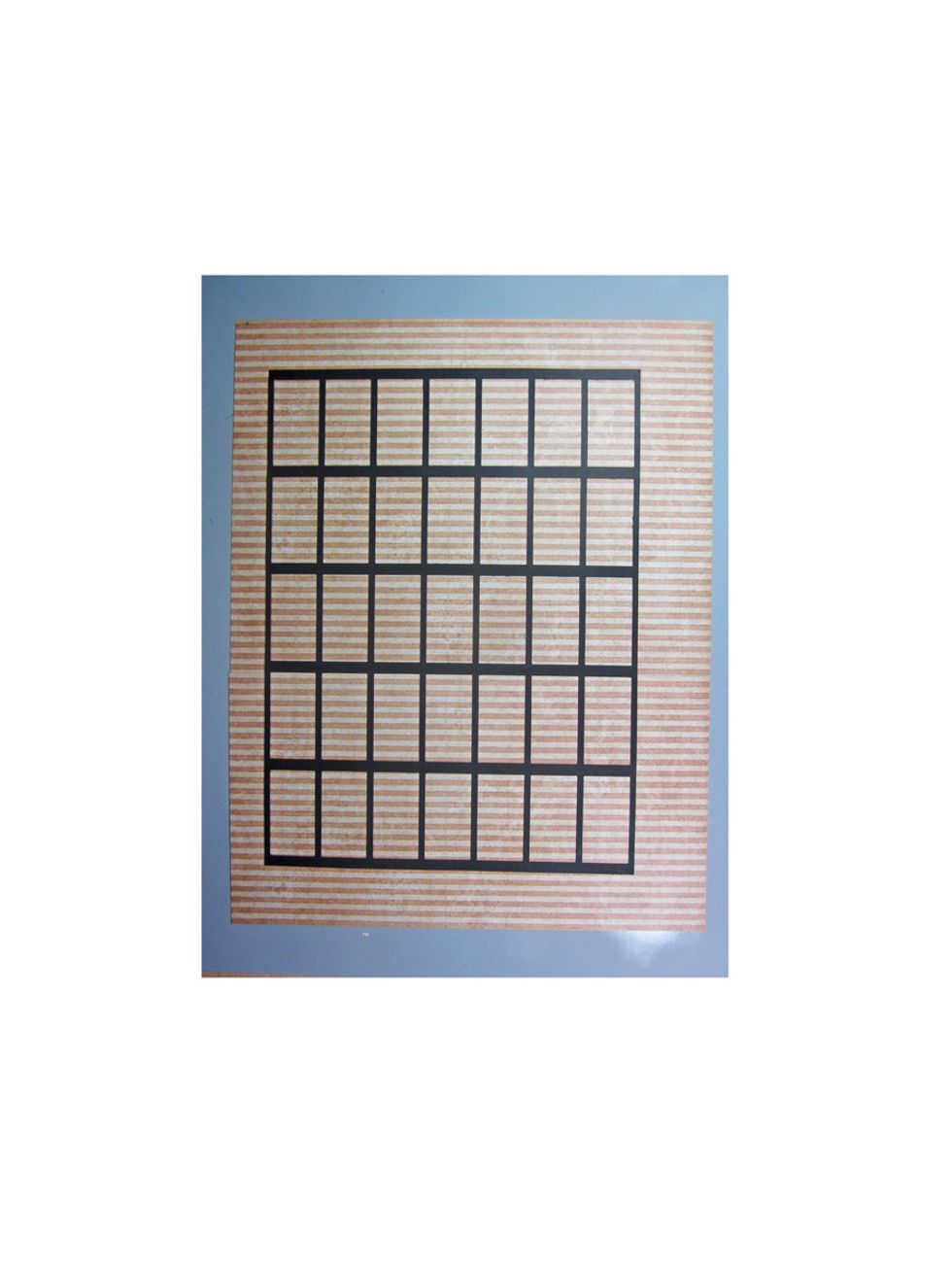 Cut a grid from your die cut machine...or if you don't have a Cricut or something similar then measure out with a ruler and X-acto tool and cut.