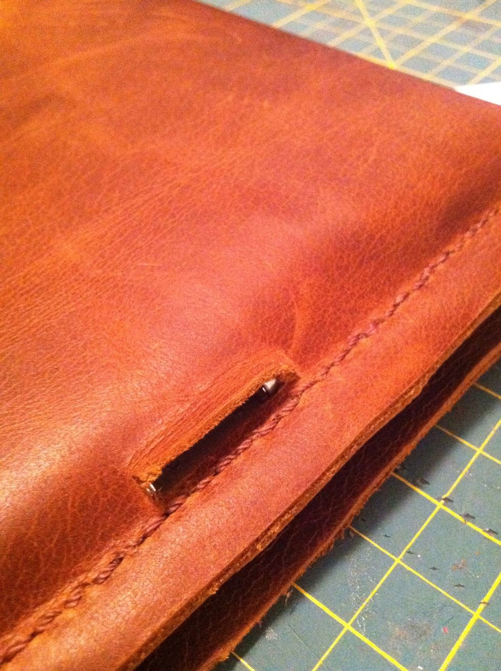 Cut a hole in the bottom for the charging plug.