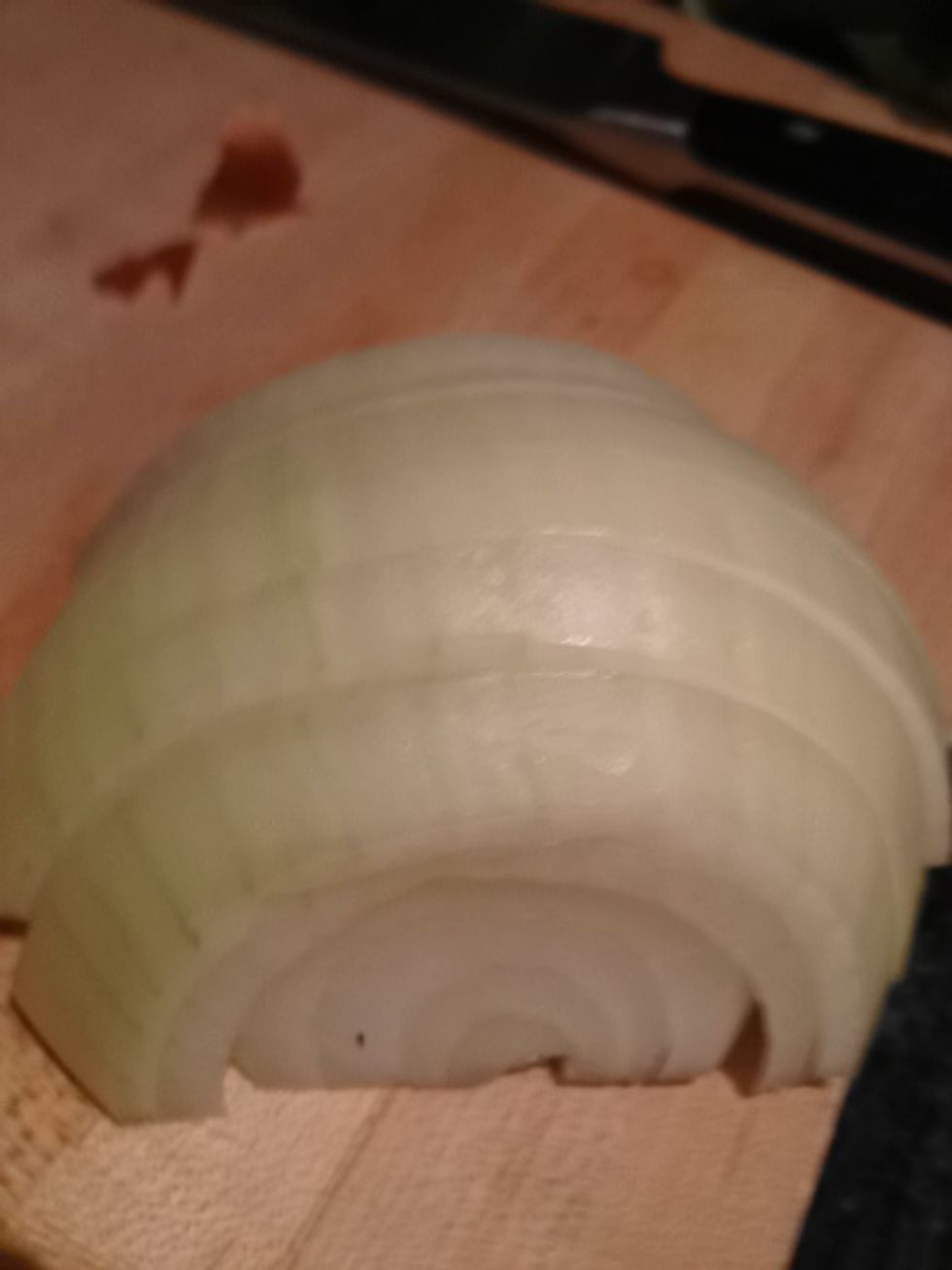 Cut a large onion into quarter inch half moons