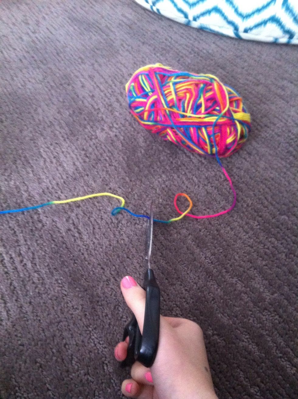 Cut a length of your thread. It doesn't matter on length. You can always tie some more on.