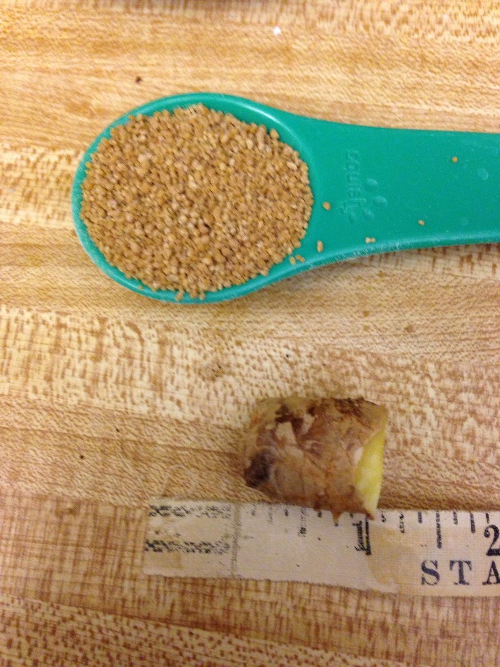 Cut a one inch section off your ginger root and measure a tablespoon of sugar.