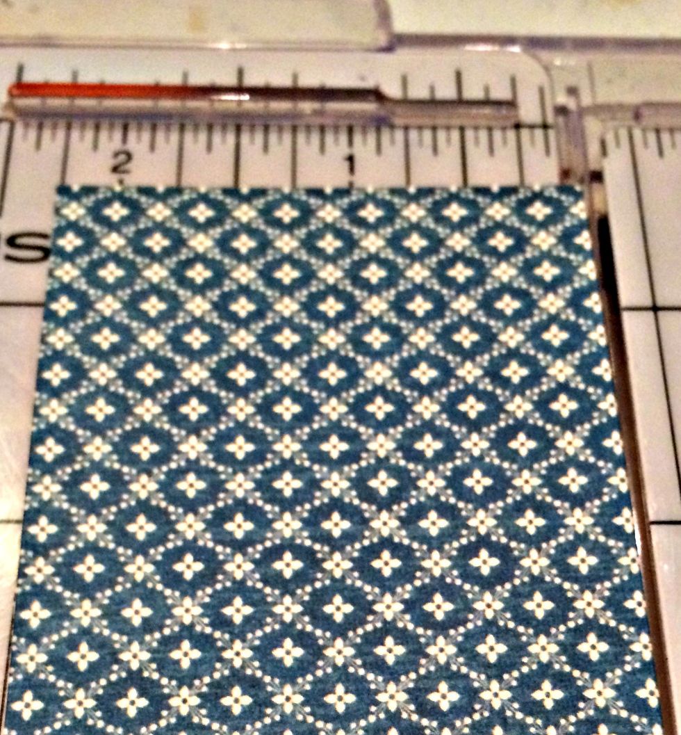 Cut a piece of Graphic 45 cardstock 2 1/4 X 12"