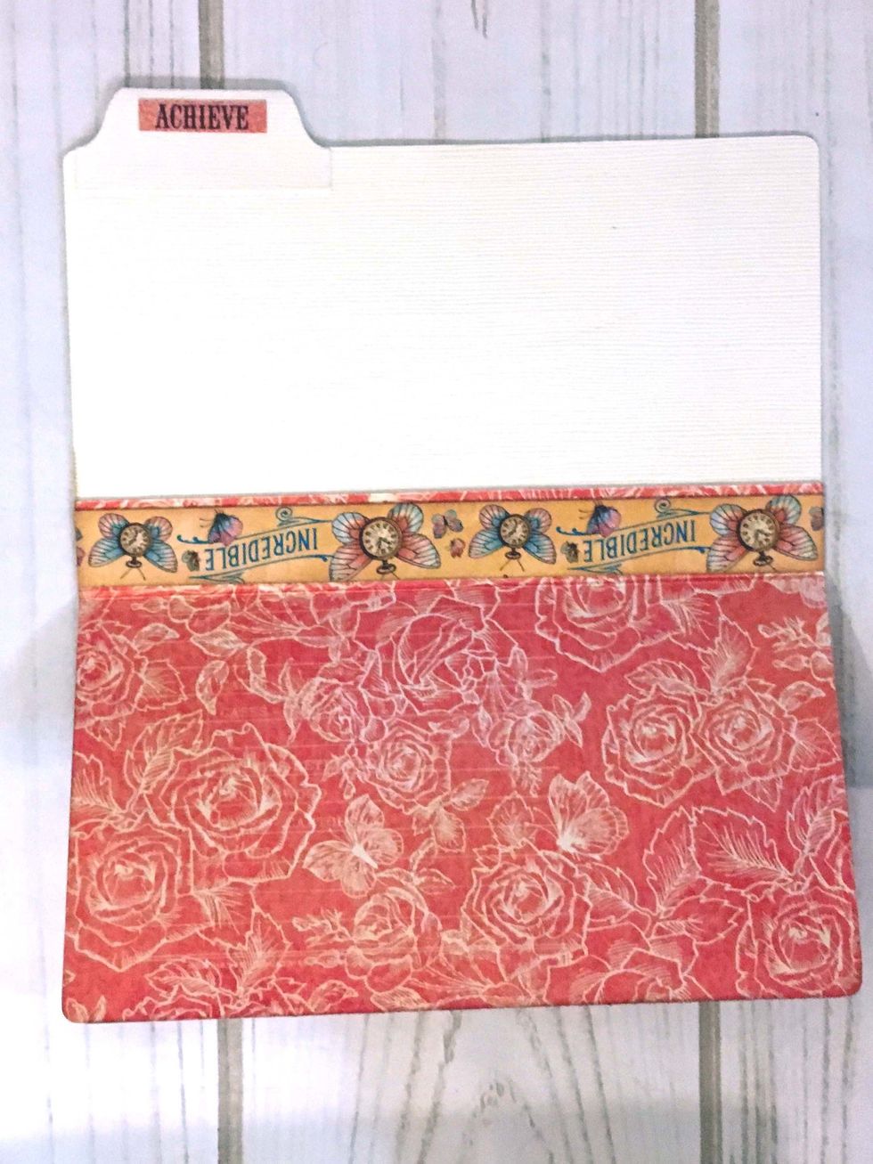 Cut a piece of ivory cardstock 6 x 3 1/2". Cut a piece of design paper 6 x 4" & score at 3/4".  Fold on the scoreline & adhere to cardstock.  Adhere a 6" piece of the Incredible strip along the fold.